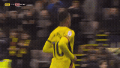 Soccer Player Wearing A Yellow Jersey With The Number 10 GIF