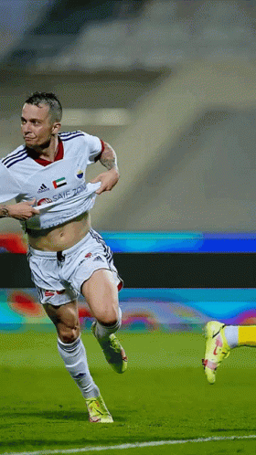 Soccer Player Wearing UAE Saif Shirt GIF