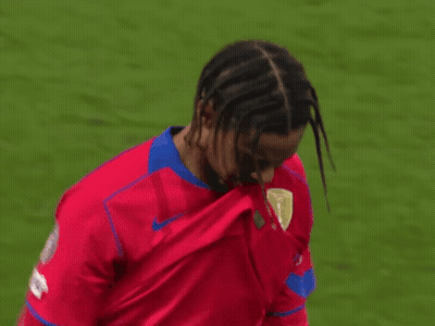 Soccer Player With Dreadlocks In Red Jersey GIF
