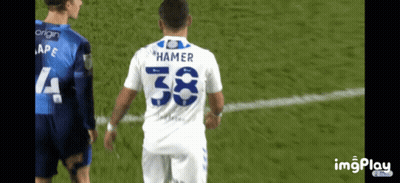 Soccer Player With Hammer On Back GIF