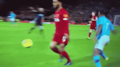 Soccer Player With Man In Liverpool Jacket GIF