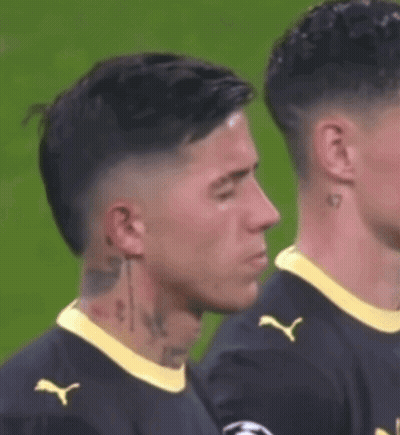 Soccer Player With Neck Tattoo Standing Next To Another GIF