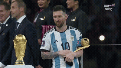 Soccer Player With Number 10 Holding Trophy GIF