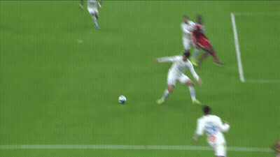 Soccer Player With Number 15 Trying To Get Ball GIF