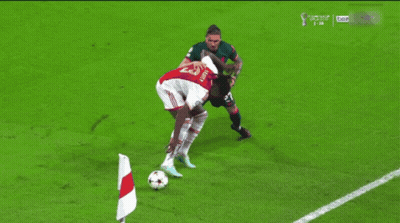 Soccer Player With Number 27 Kicks Ball GIF