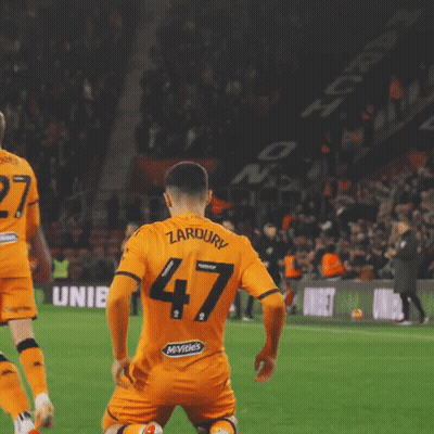 Soccer Player With Number 47 Kneeling On Field GIF