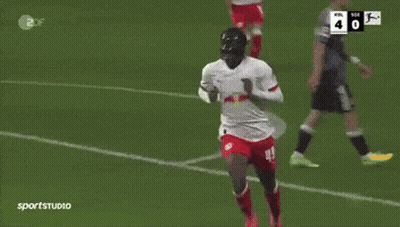 Soccer Player With Red Bull Jersey Hugged By Teammate GIF