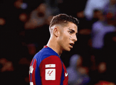 Soccer Player With Scar And Number 4 Jersey GIF