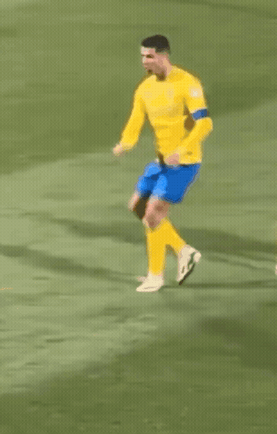 Soccer Player Yellow Shirt Blue Shorts Dancing GIF
