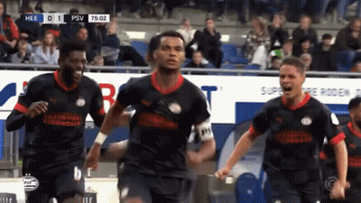 Soccer Players Celebrating Goal GIF