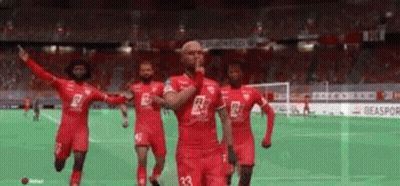 Soccer Players Celebrating Goal GIF