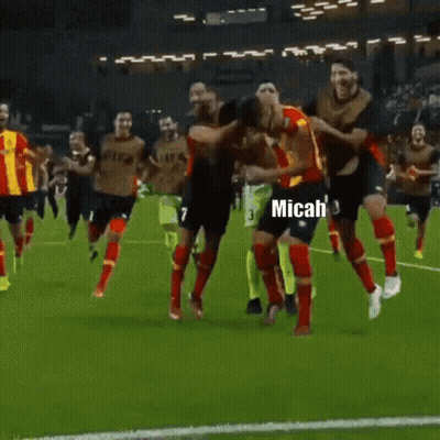 Soccer Players Celebrating Goal GIF