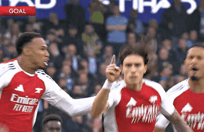 Soccer Players Celebrating Goal In Emirates Jerseys GIF