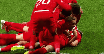 Soccer Players Celebrating Goal GIF