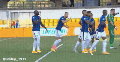 Soccer Players Celebrating Goal With Smiley 1932 Ad GIF