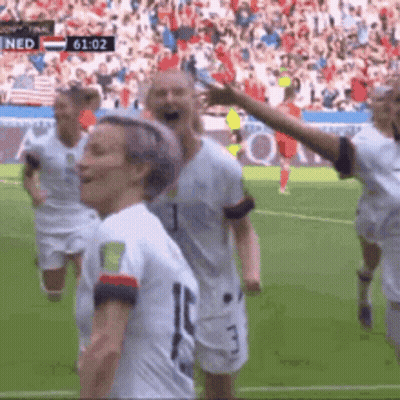 Soccer Players Celebrating Score 61:02 GIF