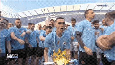 Soccer Players Celebrating With Exclusive Trophy GIF