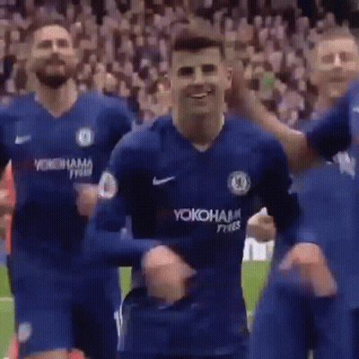 Soccer Players Dancing In Blue Jerseys GIF