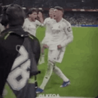 Soccer Players Dancing On Field GIF