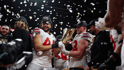 Soccer Players Holding Champions Trophy GIF