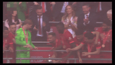 Soccer Players Holding Emirates Trophy GIF