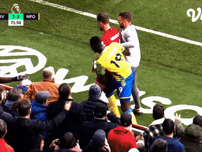 Soccer Players Holding Emirates Trophy GIF