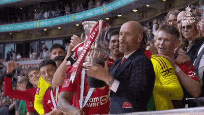 Soccer Players Holding Emirates Trophy GIF