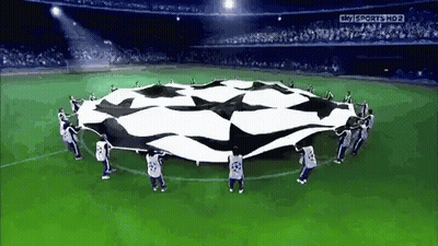 Soccer Players Holding Flag In Circle GIF