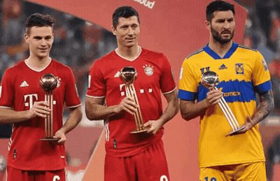 Soccer Players Holding Trophies GIF