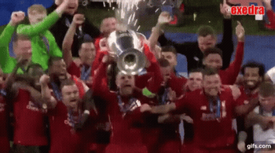 Soccer Players Holding Trophy Celebrating GIF