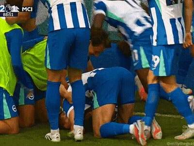 Soccer Players Huddle Around Number 19 GIF
