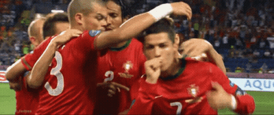 Soccer Players Huddle Around Number 3 GIF