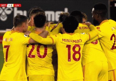 Soccer Players Huddle With Number 18 GIF