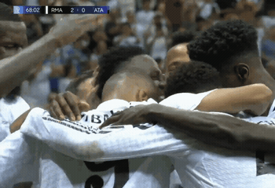 Soccer Players Huddle With Scoreboard RMA 2-0 ATA GIF