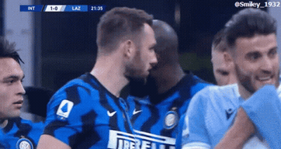 Soccer Players Huddled Wearing Irelli Shirt GIF