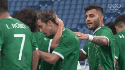 Soccer Players Huddled With Number 7 GIF