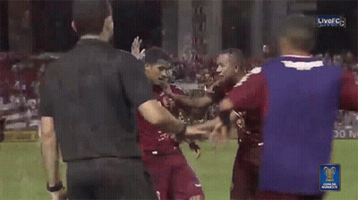 Soccer Players Huddled With Purple Shirt Saying Anaa GIF