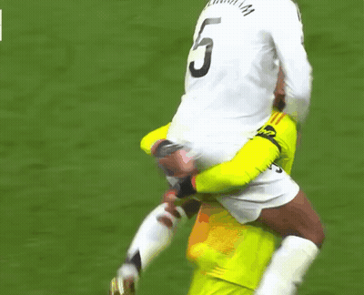 Soccer Players Hugging Number 6 Jersey GIF