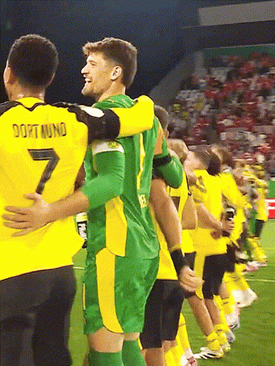 Soccer Players Hugging Number 7 GIF