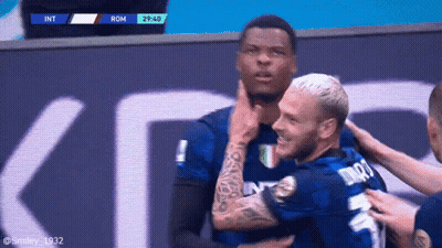 Soccer Players Hugging Number 9 Jersey GIF