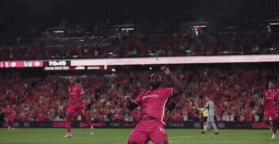 Soccer Players Hugging On Field GIF