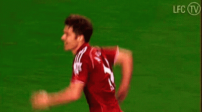 Soccer Players Hugging On Field GIF