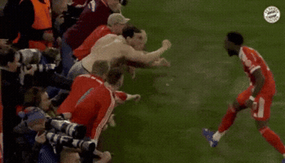 Soccer Players Hugging On Field GIF