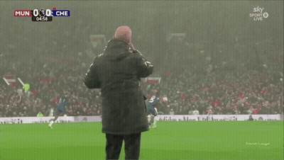 Soccer Players Hugging On Field GIF