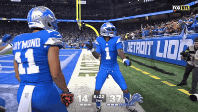 Soccer Players Hugging Saying Ironic GIF