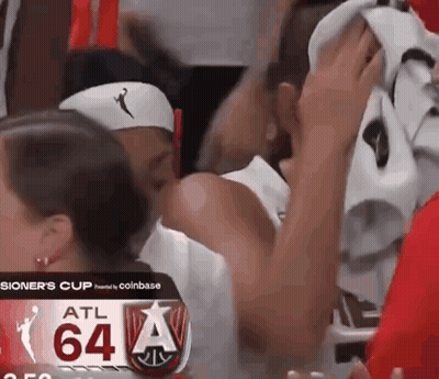 Soccer Players In Emirates Jerseys Celebrate On Field GIF