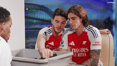 Soccer Players In Emirates Jerseys Looking At Trash GIF