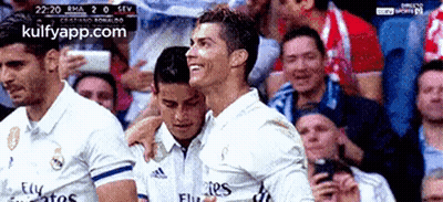 Soccer Players In Front Of Crowd With Fly Emirates Jersey GIF