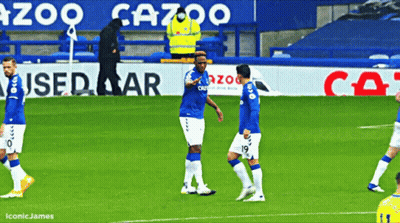 Soccer Players In Front Of Gazoo Sign GIF