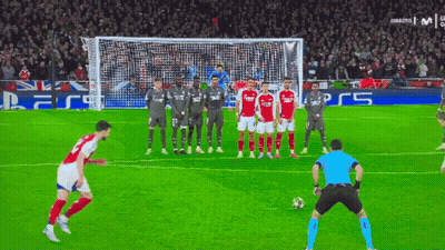 Soccer Players In Front Of Goal Saying PS5 GIF